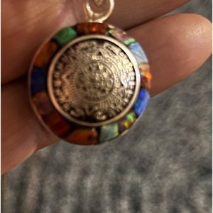 Aztec Calendar pendant from Michael’s Gallery artist from Mazatlan, Mexico.